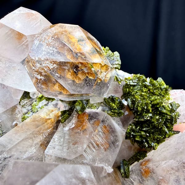 Large clear garden quartz crystals with green epidote from Sichuan, China, reverse side
