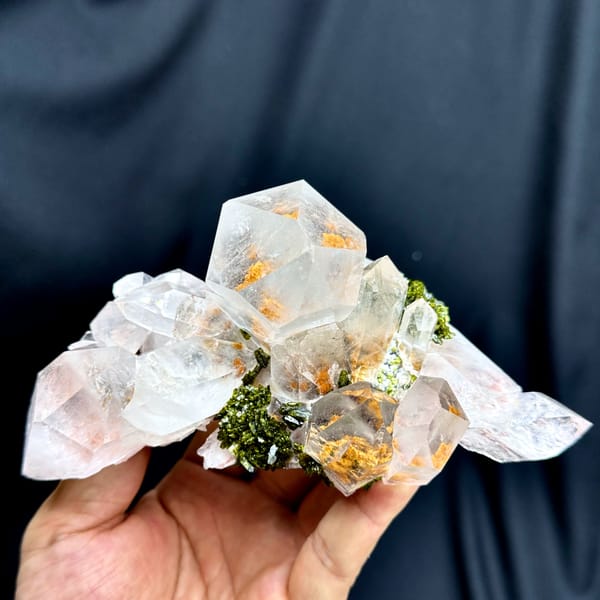 Large clear garden quartz crystals with green epidote from Sichuan, China, top view