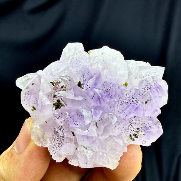 Rosette of pale purple-red garden quartz crystals from Sichuan, China, top view