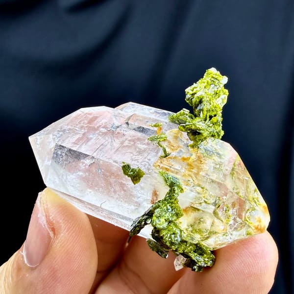 Double-terminated quartz crystal with yellow-green epidote collar from Sichuan, China, reverse side