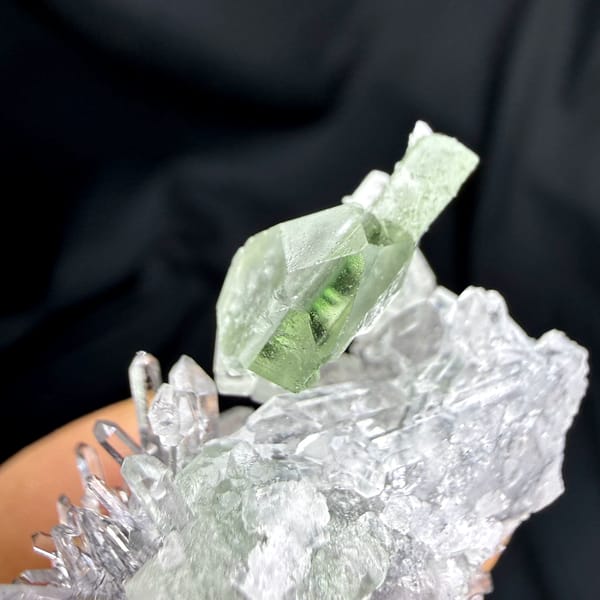 Flat green fluorite with clear quartz needles from Fujian, China, reverse side
