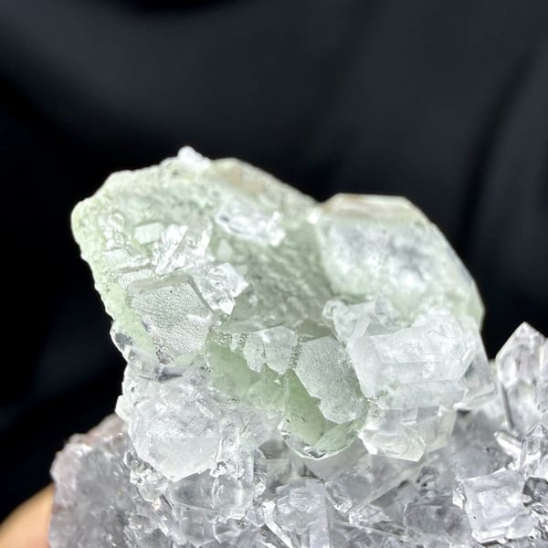 Flat green fluorite with clear quartz needles from Fujian, China, top view