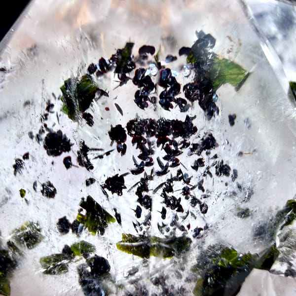 Clear quartz crystals with black-green epidote inclusions from Sichuan, China, second angle