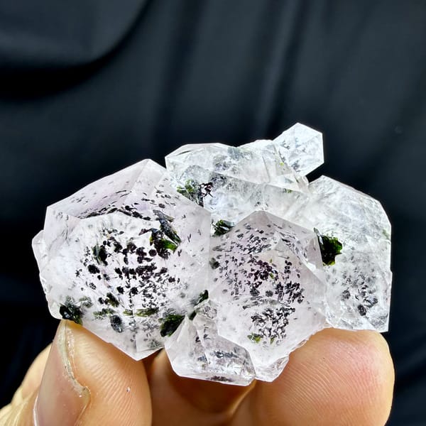 Clear quartz crystals with black-green epidote inclusions from Sichuan, China, reverse side