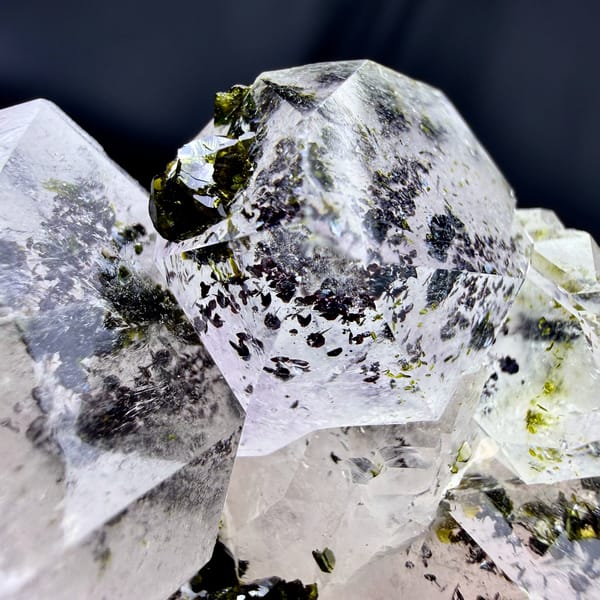 Clear garden quartz cluster with dark green epidote from Sichuan, China, top view