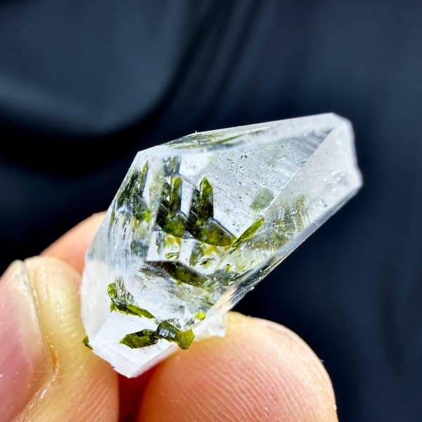 Small clear quartz point with green epidote from Sichuan, China, second angle