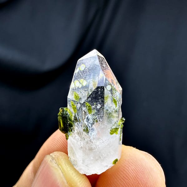 Small clear quartz point with green epidote from Sichuan, China, reverse side