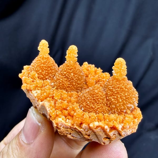 Orange gourd-shaped stalactitic calcite from Yunnan, China, second angle