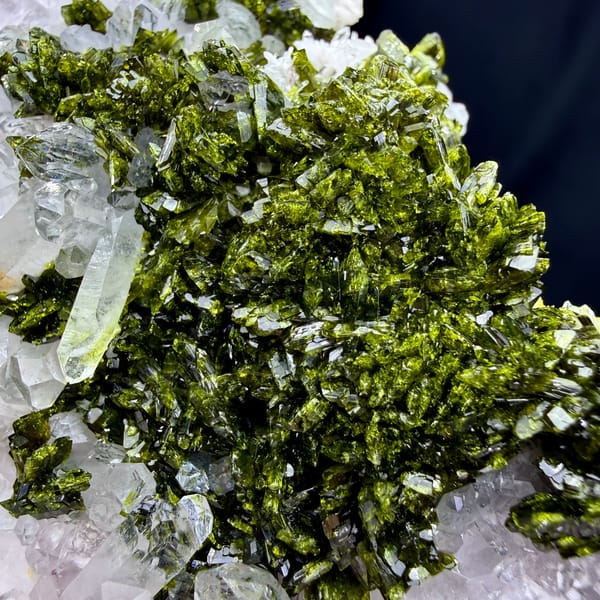 Wide clear quartz floater with green epidote carpet from Sichuan, China, second angle