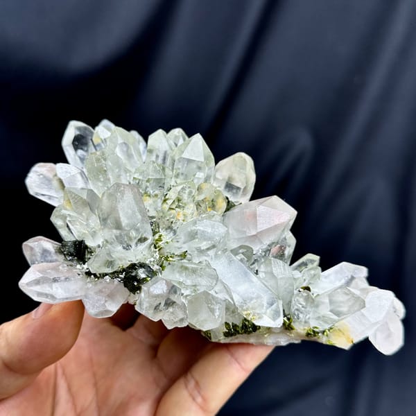 Flower-shaped fan of clear garden quartz with epidote from Sichuan, China, top view