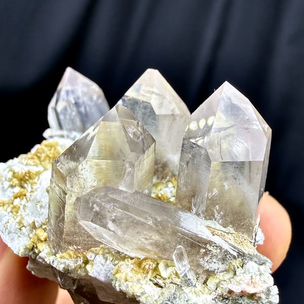 Gradient smoky quartz points on feldspar and mica from Yunxiao, Fujian, China, second angle