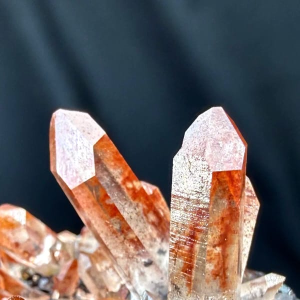 Red-skinned quartz needles on black specular hematite from Guangdong, China, second angle