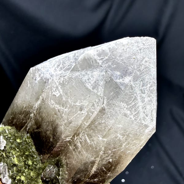 Large gradient quartz crystal with snowflake inclusions and green fluorite from Yunxiao, Fujian, China, top view