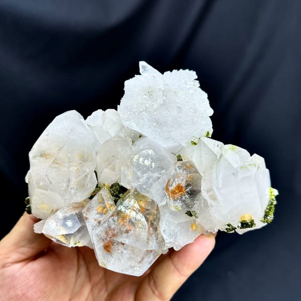 Large transparent garden quartz crystals with epidote from Sichuan, China, close-up of the crystal faces