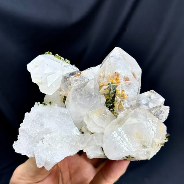 Large transparent garden quartz crystals with epidote from Sichuan, China, detail of the matrix contact