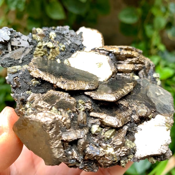 Stacked bronze pyrrhotite plates with chalcopyrite and quartz from Inner Mongolia, China, top view