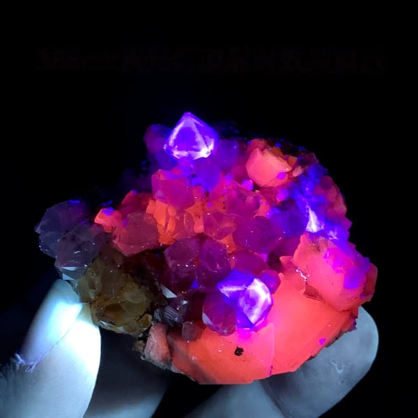 Yellow and green fluorite octahedra on white quartz from Fujian, China, second angle