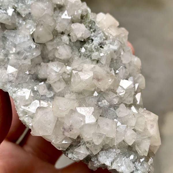 Pale scheelite crystals with white calcite from Yaogangxian Mine, Hunan, China, reverse side