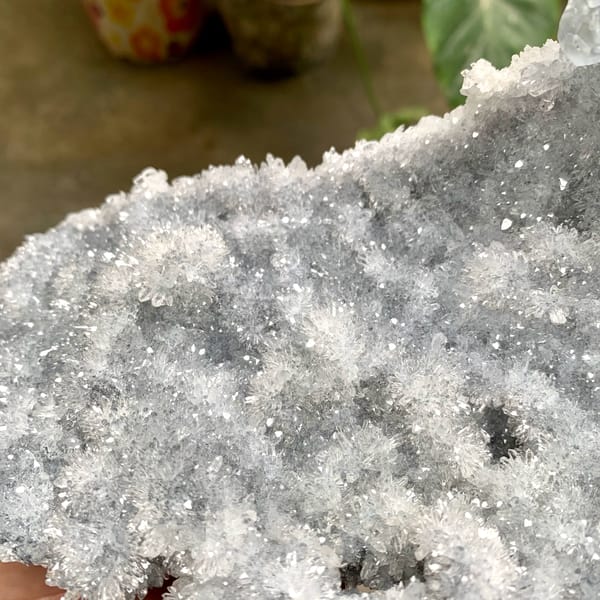 Long plate of sparkling quartz druse with blue-cored fluorite from Fujian, China, top view