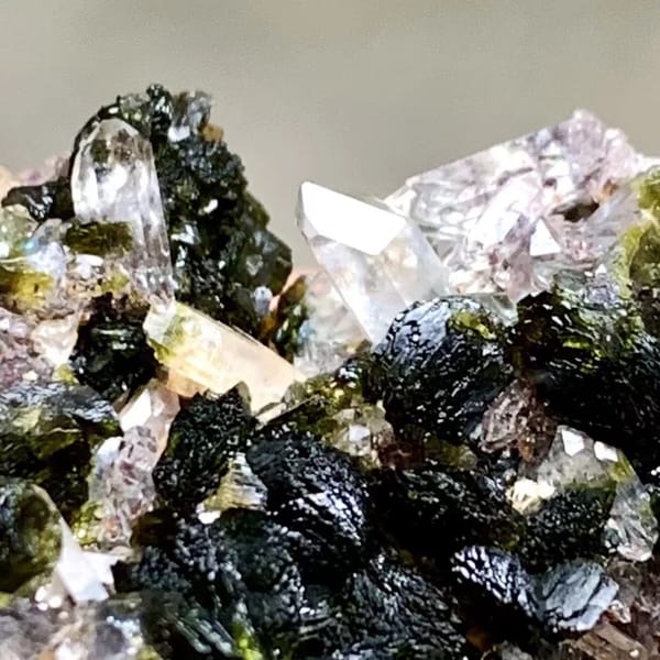 Dark green epidote blades with lilac quartz from Yunnan, China, second angle