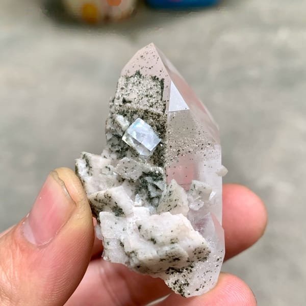 Clear quartz prism with fluorite cube and chlorite on dolomite from Yaogangxian Mine, Hunan, China
