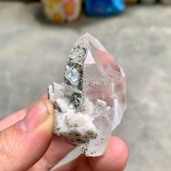 Clear quartz prism with fluorite cube and chlorite on dolomite from Yaogangxian Mine, Hunan, China, reverse side