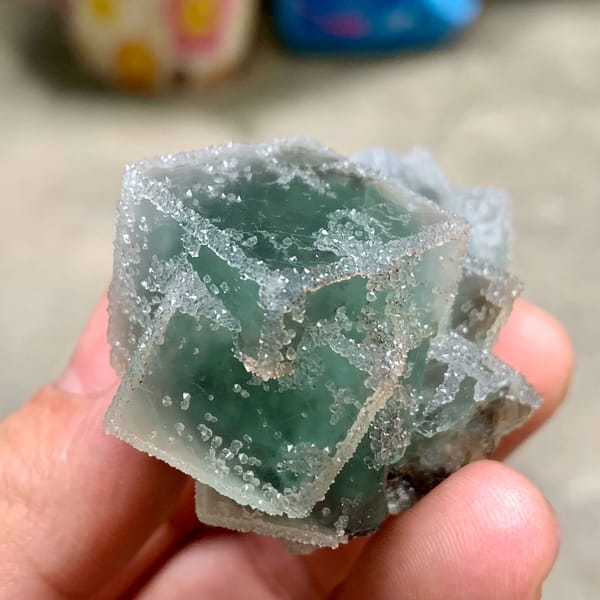Three sugar-frosted green fluorite cubes from Fujian, China, second angle