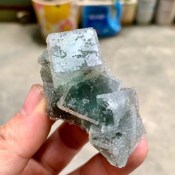 Three sugar-frosted green fluorite cubes from Fujian, China, top view
