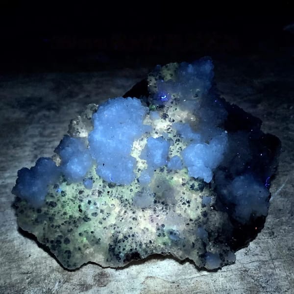 Purple yttrofluorite with white gypsum crust from Guizhou, China, second angle