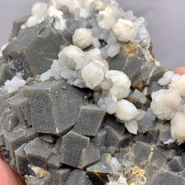 Dark garnet crystals with white calcite balls from Inner Mongolia, China, top view