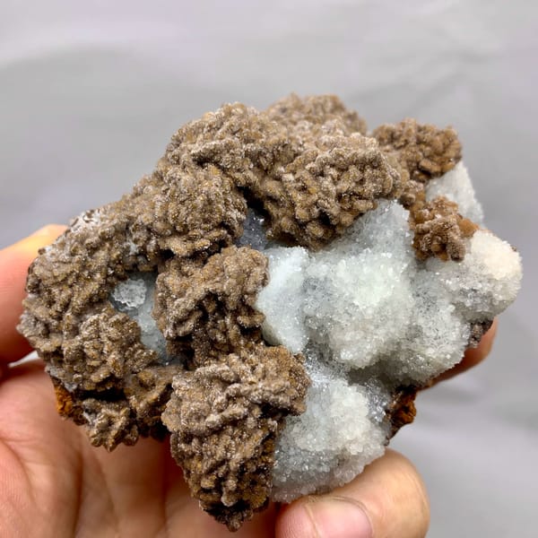 Chocolate-brown calcite over white sugar fluorite from Fujian, China, reverse side
