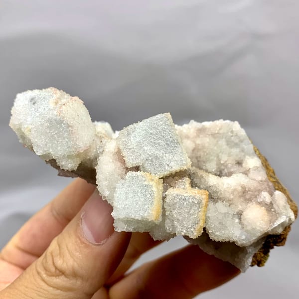 White sugar-frosted fluorite cubes on quartz from Fujian, China, top view