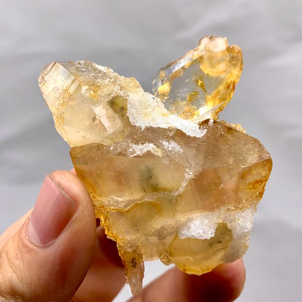 Golden natural citrine quartz floater from Guangdong, China, second angle