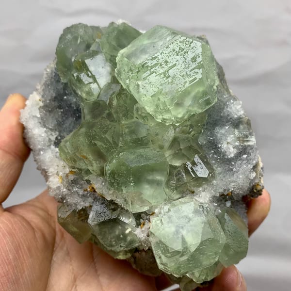 Cluster of large glassy sea-green fluorite cubes from Fujian, China, top view