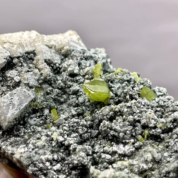 Yellow-green titanite crystals on green chlorite plate from Pakistan, top view