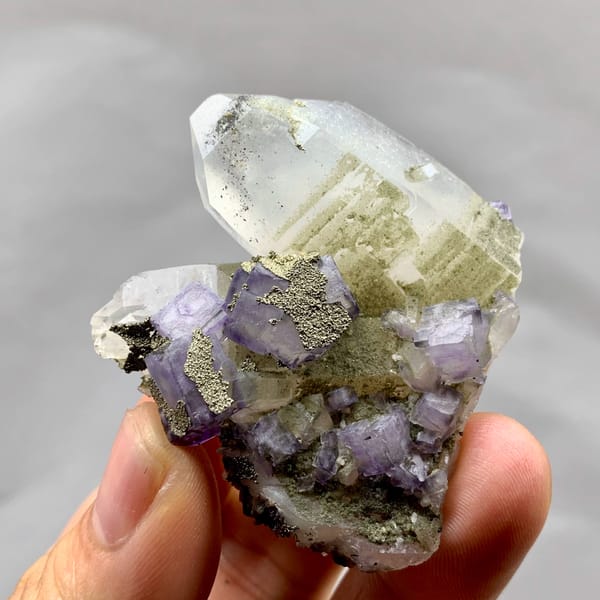 Purple fluorite cubes with pyrite on clear quartz from Yaogangxian Mine, Hunan, China, second angle