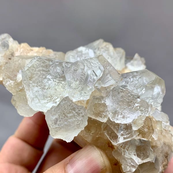 Etched white fluorite octahedra with calcite from Inner Mongolia, China, top view