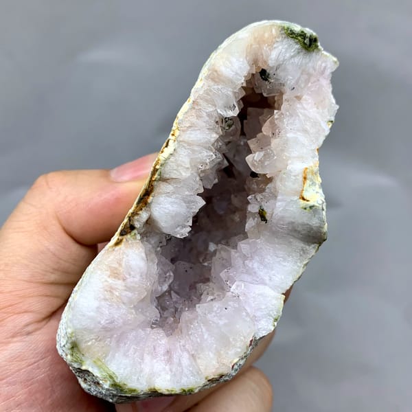 Pale lilac quartz geode with green epidote from Sichuan, China, second angle