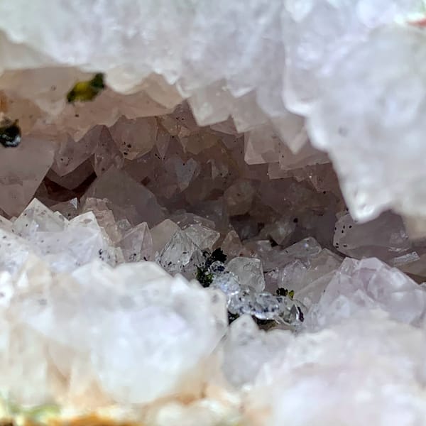 Pale lilac quartz geode with green epidote from Sichuan, China, reverse side