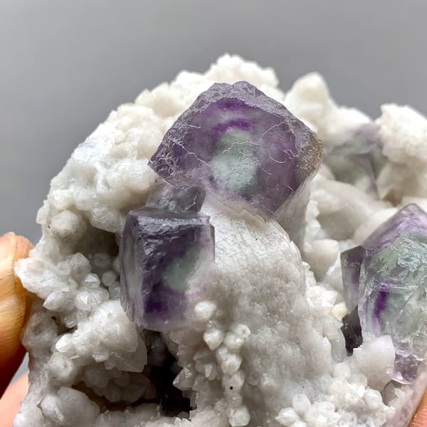 Purple-edged green fluorite cubes in white quartz from Inner Mongolia, China, second angle