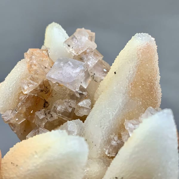 Peach-toned quartz pseudomorphs after calcite from Zhejiang, China, reverse side