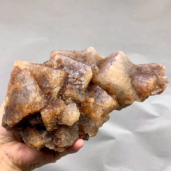 Large block of purple and yellow QR-code patterned fluorite cubes from Guizhou, China
