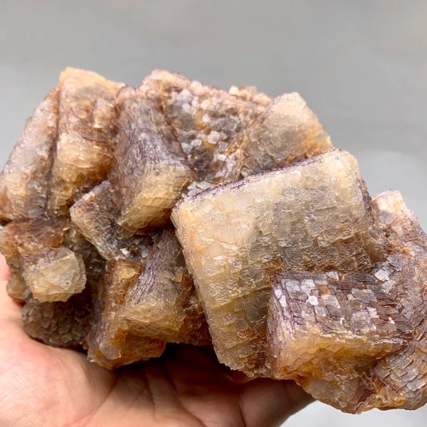 Large block of purple and yellow QR-code patterned fluorite cubes from Guizhou, China, reverse side