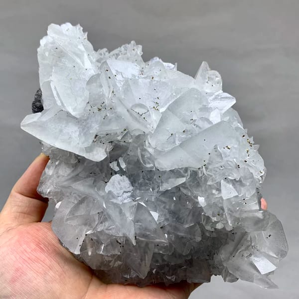 Large plate of glassy calcite blades with pyrite from Xianghualing, Hunan, China, top view
