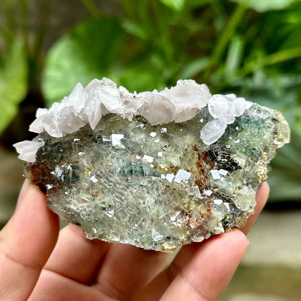 Glassy green fluorite cubes with white calcite and pyrolusite from Xianghualing, Hunan, China