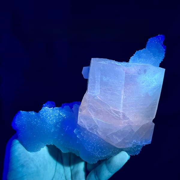 Giant hexagonal calcite prism on white quartz from Fujian, China, second angle