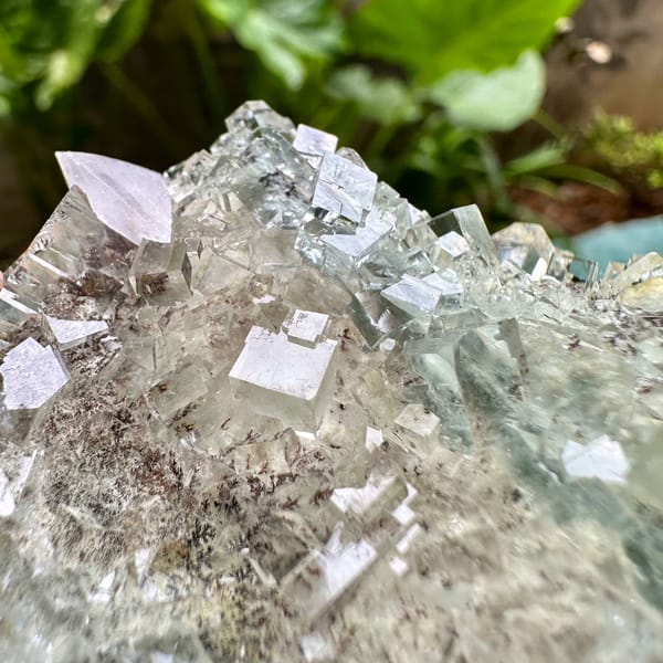Gemmy pale-green fluorite cubes with calcite from Xianghualing, Hunan, China, reverse side