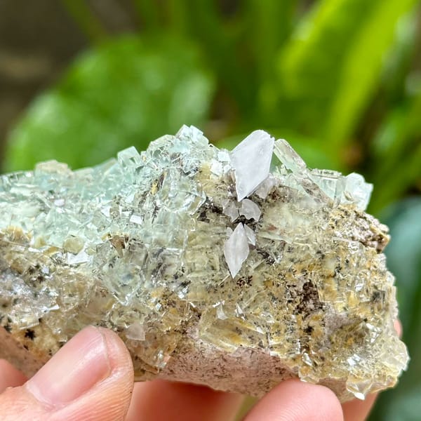 Gemmy pale-green fluorite cubes with calcite from Xianghualing, Hunan, China, top view