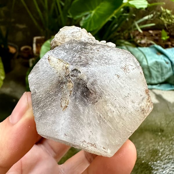 Large flat hexagonal calcite crystal with quartz from Fujian, China, close-up of the crystal faces