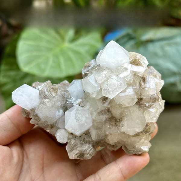 Clear quartz points with prismatic calcite from Fujian, China, detail of the matrix contact